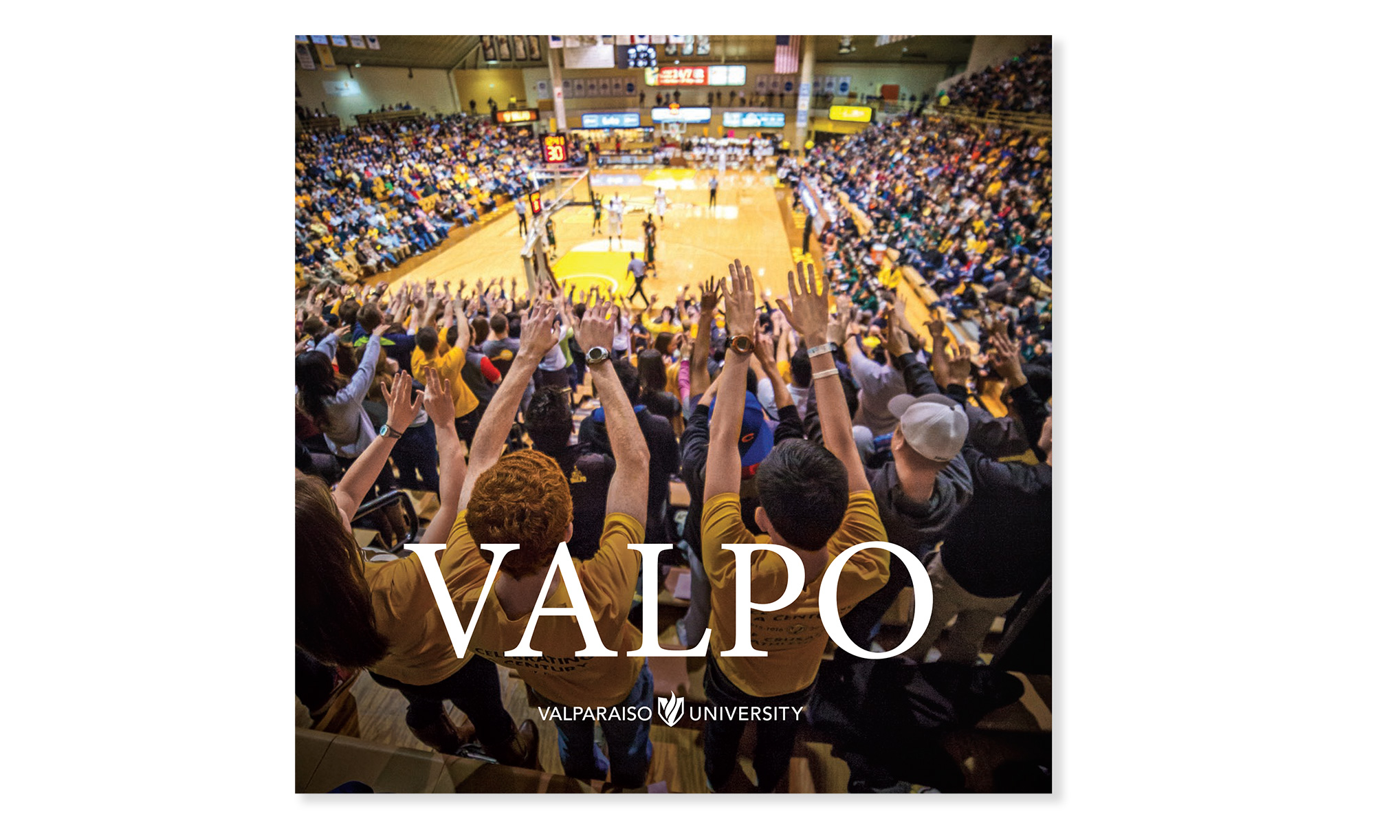 Brochure cover showing crowd at a basketball game.