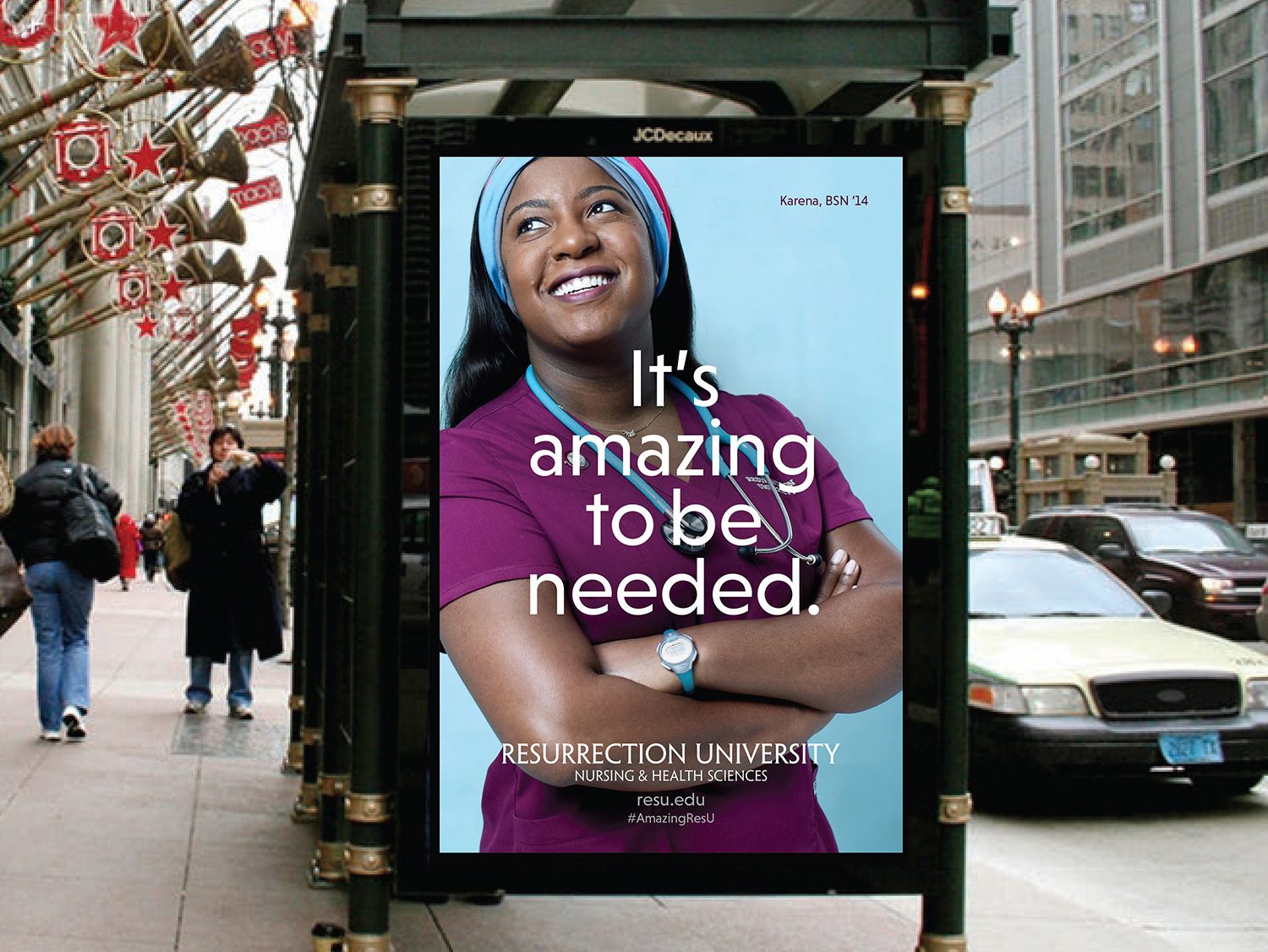 "It's amazing to be needed" creative displayed on a bus stop shelter.